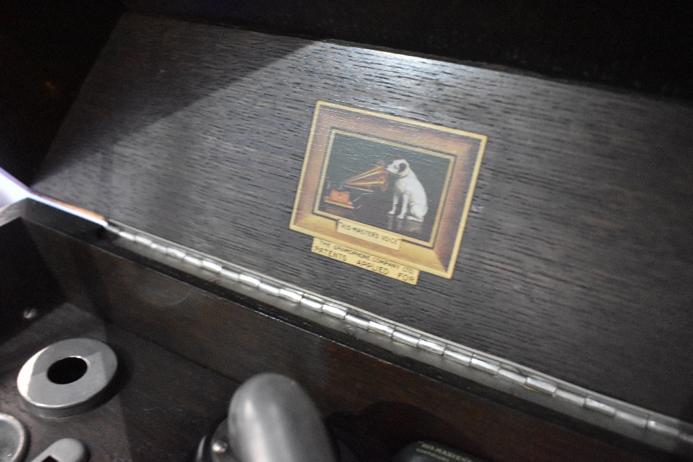 A late 19th or early 20th Century oak cased gramophone player by HMV and a selection of 78rpm - Image 2 of 3
