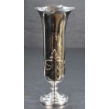 A George V silver vase of flared cylindrical form with lobed rim, foliage strapwork below raised