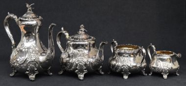 A Victorian silver four piece tea and coffee set, comprising tea pot, coffee pot, cream and sugar of