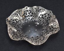 A late 20th century Irish silver dish of hexagonal ruffled and pierced form, marks for Dublin, 1972,