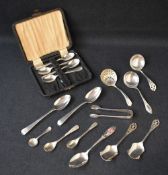 A George V silver sugar sifter spoon with pierced scallopped bowl, marks for Sheffield 1918, maker