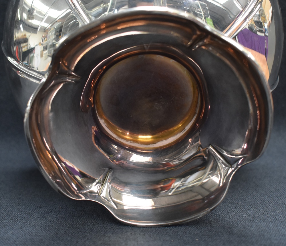An Edwardian silver punch bowl, of circular lobed petal moulded design raised on a conforming - Image 3 of 4