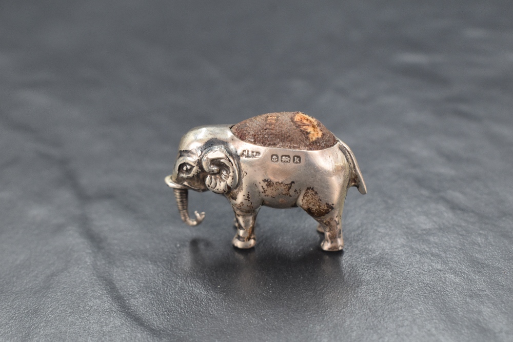 An Edwardian silver novelty pin cushion modelled as an elephant having dark fabric to the back, - Image 2 of 4