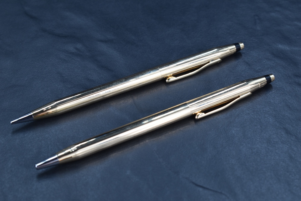 A Cross 14ct solid gold mechanical pencil and ball pen set, cases marked 585 14K, with Cross pen