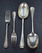 A pair of Edwardian silver Hanoverian pattern table spoons, with rat-tail reverse having engraved