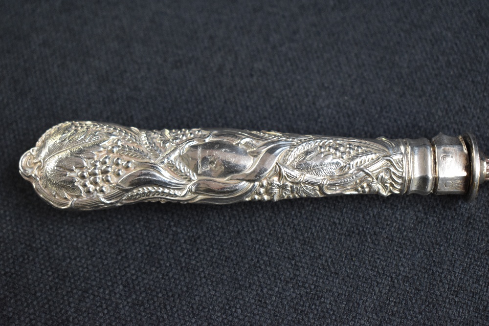 A 19th century silver and white metal candle snuffer, the silver embossed handle of a foliage design - Image 4 of 6