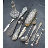 An assortment of silver and silver mounted items, including a sword motif book mark with mother-of-