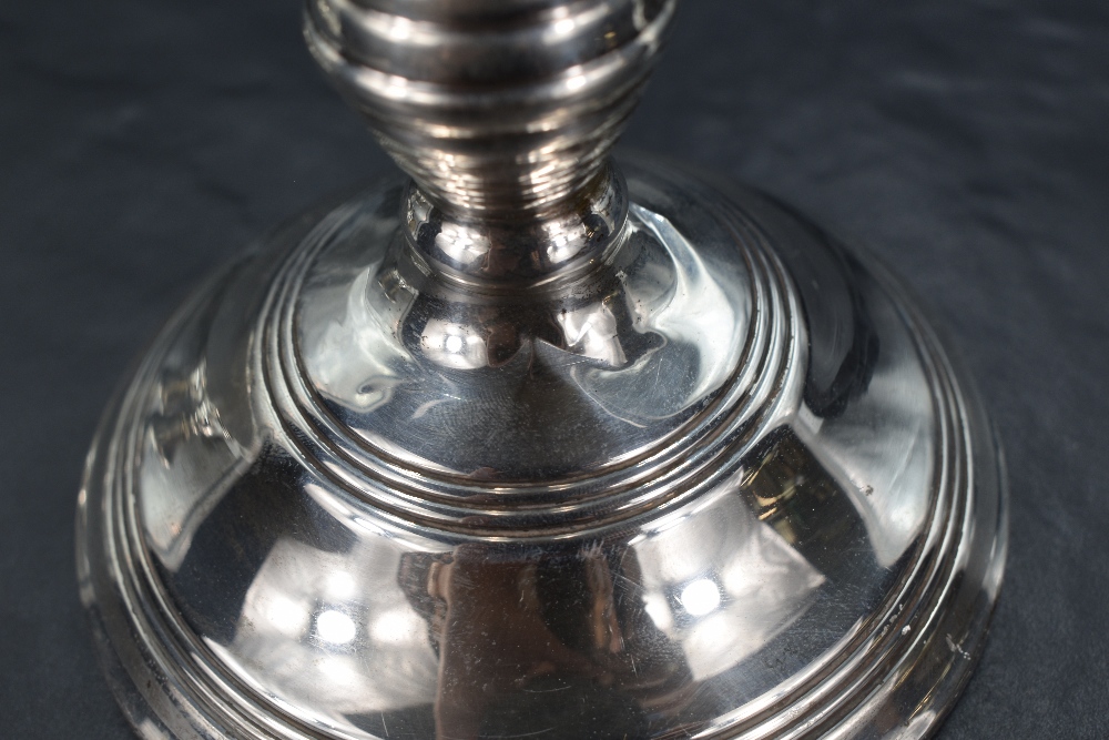 A pair of Elizabeth II silver squat candlesticks, the sconces of circular form raised on weighted - Image 11 of 11