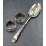 A George III silver serving spoon of Old English design, engraved 'MJ' to terminal, marks for London