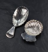 A George III silver leaf design caddy spoon with bright cut engraving, marks for London 1800, rubbed