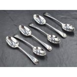 A cased set of six George V silver teaspoons of Old English pattern with initial engraving at