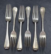 A set of six Edwardian Hanoverian pattern silver forks, all with engraved crest to terminal reverse,