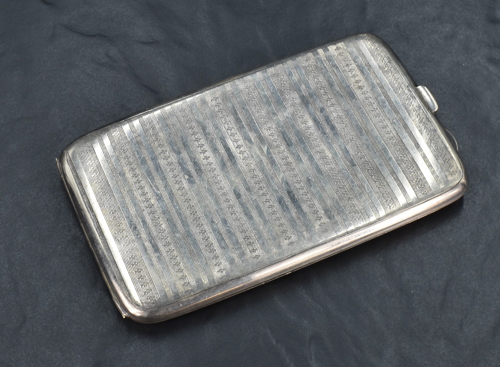 A George V silver cigarette case of rectangular form, having vertical stripes of engine turned - Image 2 of 7