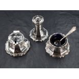 An early 20th century silver three-piece condiment set, of spreading stylised petal design with