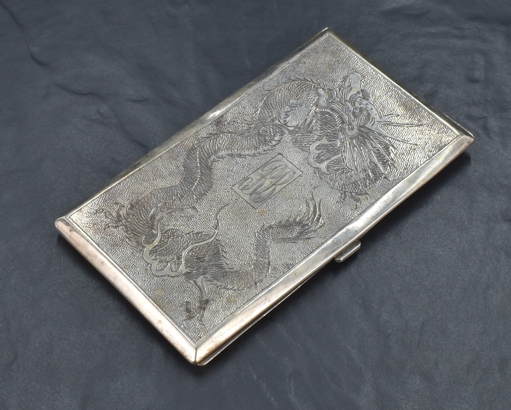 An early 20th century Chinese export 900. grade white metal cigarette case, of rectangular form