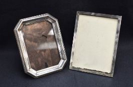 A silver mounted wooden photo frame with engraved line detail, marks for Birmingham 1923, maker