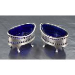 A pair of Scottish George III silver salts, of elliptical form with reeded rims over repeating