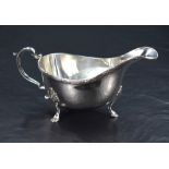 A Queen Elizabeth II silver sauce boat, of traditional form with reeded foliate ornamented rim,