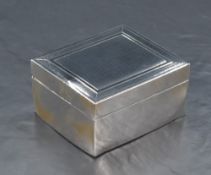 A George V silver cigarette box, of hinged rectangular form with engine-turned decoration to the