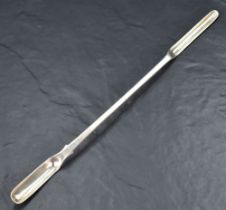 A Victorian silver marrow scoop, of elongated form, with pronounced drops, the broader end with