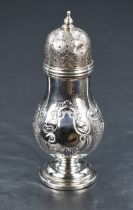A Victorian silver sugar caster, having a pierced, finial topped and engraved cover over the foliate
