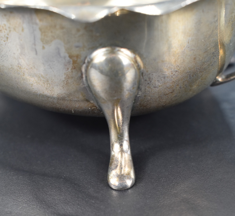 A George VI silver sauce boat of traditional design, with Chippendale style rim, generous spout - Image 2 of 3