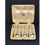 A cased set of six George VI teaspoons, having decorative enamel to terminals, marks for
