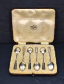 A cased set of six George VI teaspoons, having decorative enamel to terminals, marks for