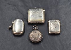 Two George V silver vesta cases both having decorative engraving and monogram, one of AR the other