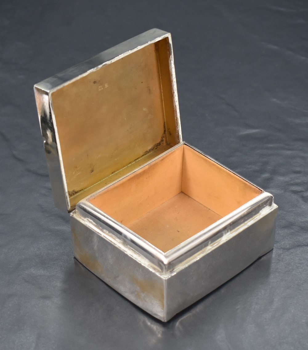 A George V silver cigarette box, of hinged rectangular form with engine-turned decoration to the - Image 3 of 9