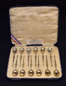 A set of twelve early 20th century silver spoons, replicating the Anointing Spoon used as part of
