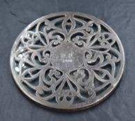 An early 20th century silver mounted glass teapot stand made for Tiffany & Co., having an Art