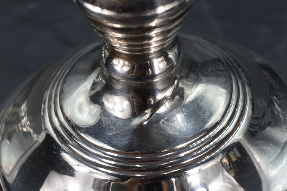 A pair of Elizabeth II silver squat candlesticks, the sconces of circular form raised on weighted - Image 10 of 11