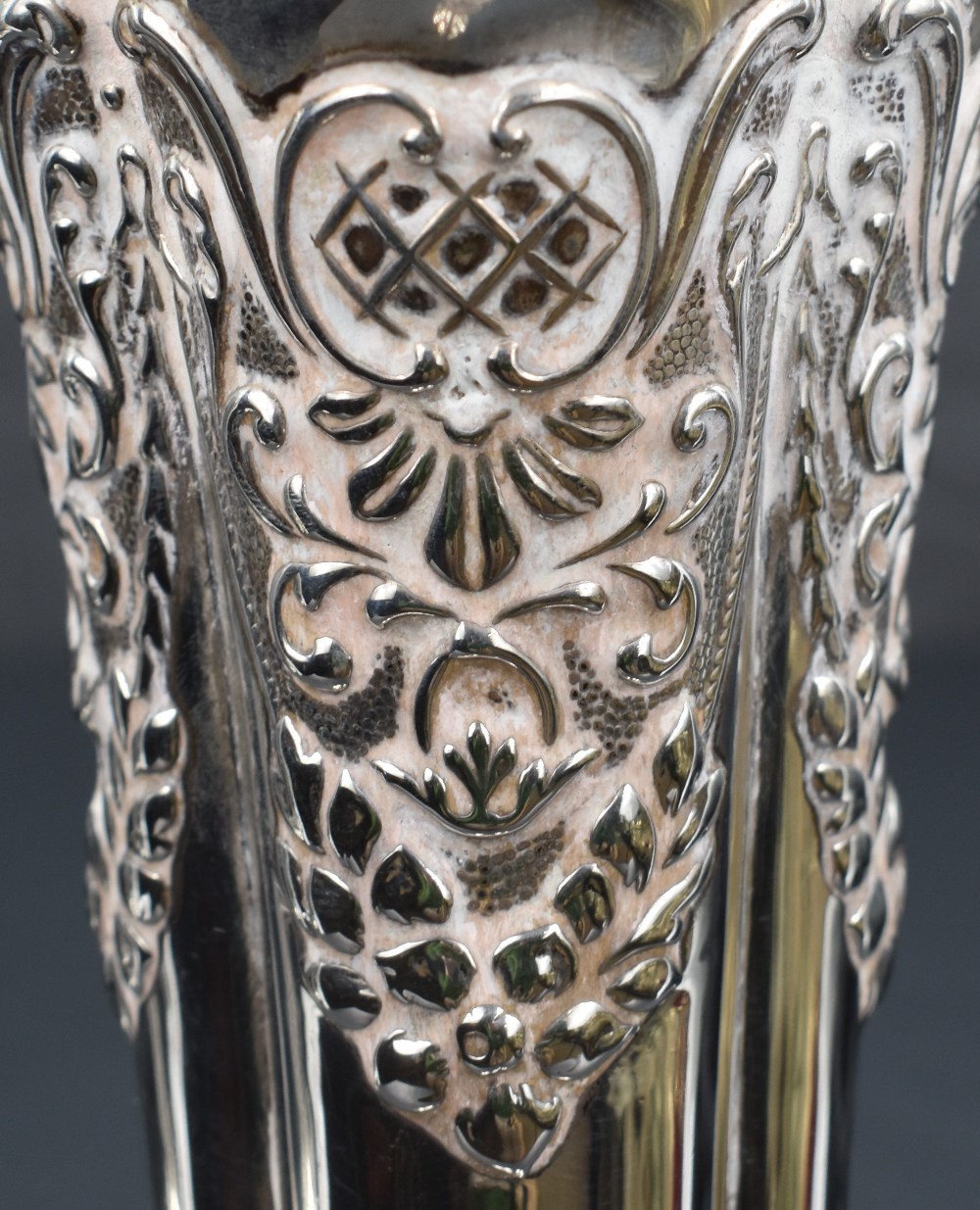 A pair of Edwardian silver vases, of lobed column form having embossed damask swag decoration, marks - Image 2 of 7