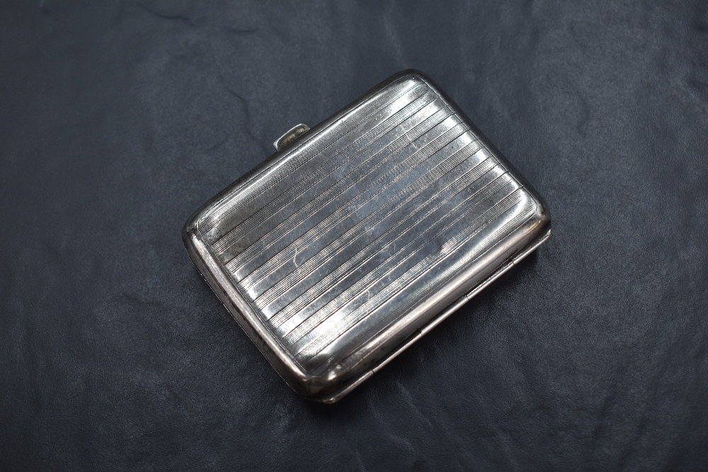 A George V silver cigarette case, having vertical engine turned decoration with a circular cartouche - Image 2 of 6