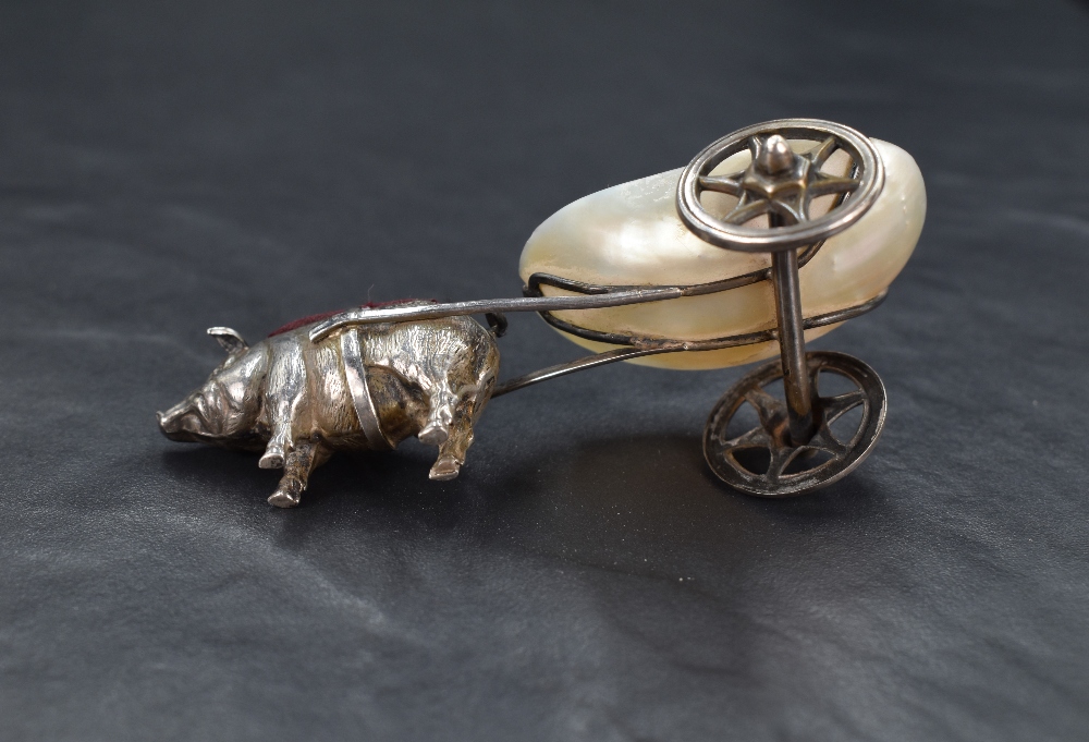 An Edwardian silver novelty pin cushion modelled as a pig pulling a cart fashioned from mother-of- - Image 4 of 5
