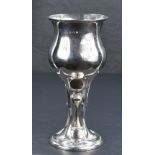 An Edwardian silver Art Nouveau chalice of flared bluster form on a knopped stem and moulded