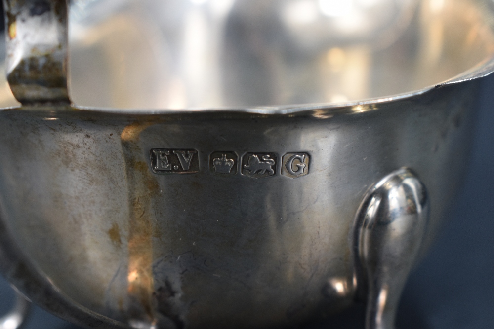 A George VI silver sauce boat of traditional design, with Chippendale style rim, generous spout - Image 3 of 3