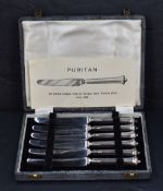 A set of six early Elizabeth II silver handled butter knives, having handles adapted from an antique