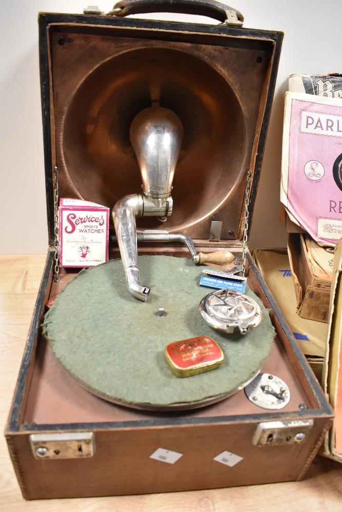 An early 20th Century portable gramophone, with stitched brown leather case, measuring 26cm x 30cm x - Image 2 of 3