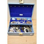 A mid-20th Century blue tooled leather jewellery box with contents, including a Celtic style