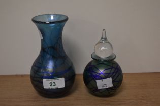 An Adrian Sankey art glass perfume bottle and a vase, both in iridescent mottled blue hues.