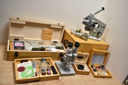 An assorted collection of scientific equipment, to include a Lomo Biolam microscope, lenses, and