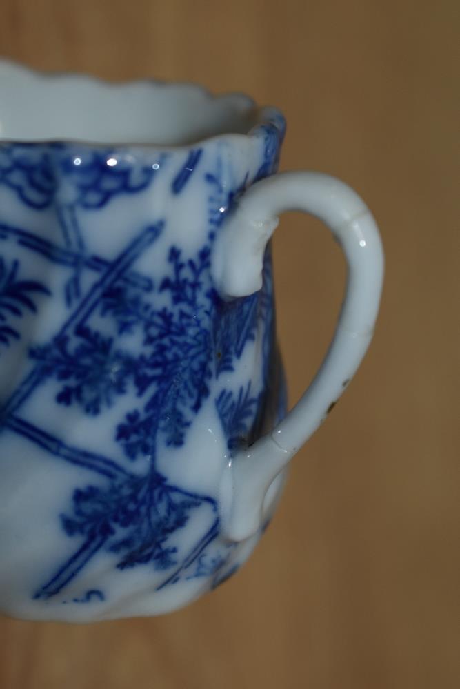 A 19th Century blue and white porcelain miniature jug, measuring 5cm, and a Chinese polychrome - Image 2 of 4