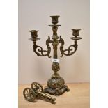 A Victorian brass three branch candelabra, measuring 40cm tall, sold with an ornamental brass