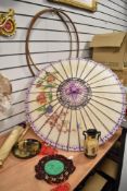 A 20th Century Oriental paper parasol, decorated with butterflies, measuring 72cm in diameter,