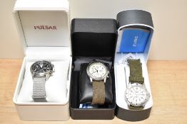Three gents wrist watches, including Pulsar and two lorus watches, all in boxes.