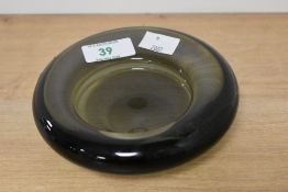 A mid century Danish smoked glass ashtray, Per Lutken 1916-1998, for Holmegaard glass factory,
