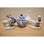 A pair of mid-20th Century German porcelain figural ornaments, a Wedgwood Meadow Sweet bud vase, and