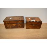 A late 19th / early 20th century tea caddy with inlaid shell decoration to edge and another inlaid